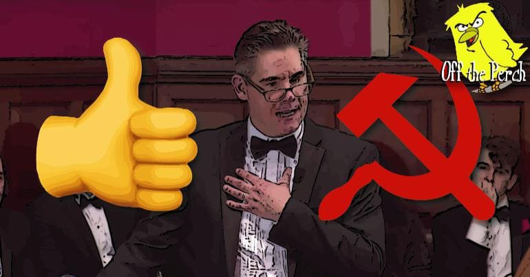 Dan Hodges with a hammer and sickle and thumbs up over him