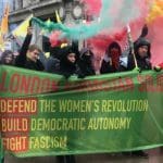 Protesters with banner