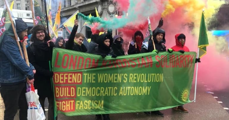 Protesters with banner