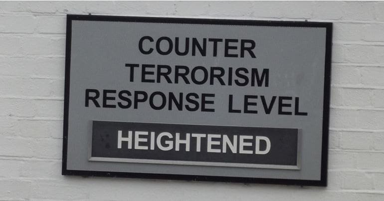 Sign saying "Counter Terrorism Response Level Heightened"