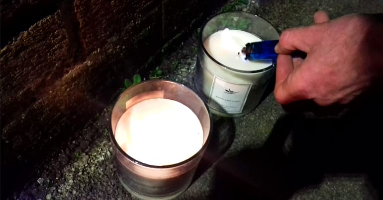 Tealights being lit with a lighter