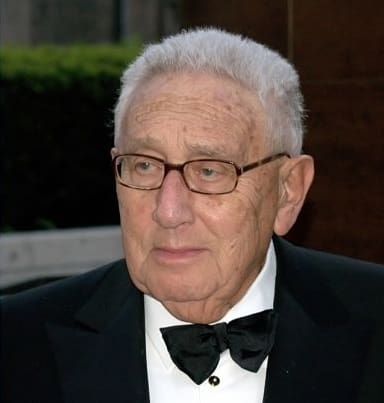 Alan Duncan, right; Henry Kissinger, left