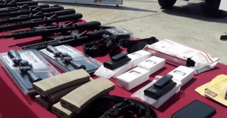 Arms allegedly found aboard US plane to Venezuela.