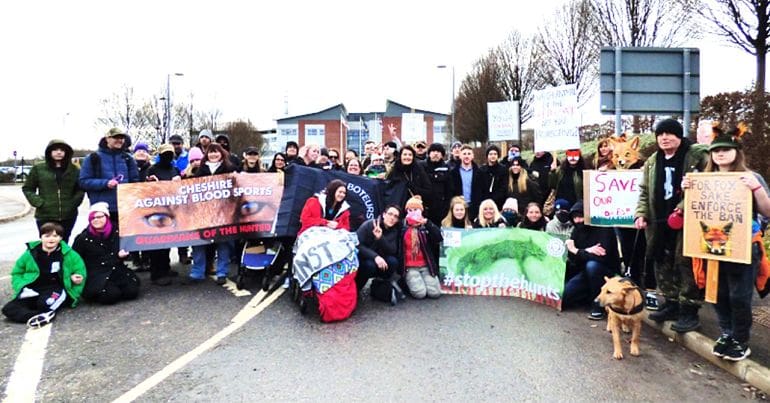 People at a protest against hunting