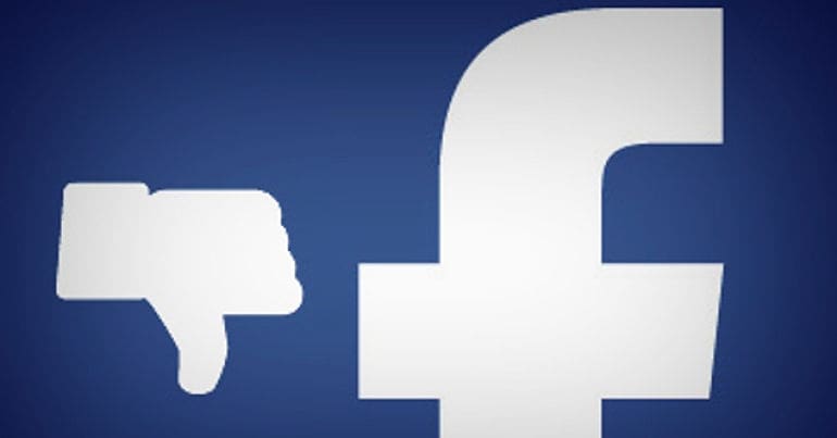 Thumbs down sign beside Facebook logo