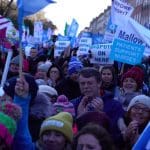 People protesting in Dublin in support of nurses and midwives on strike