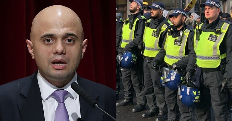 Sajid Javid and a line of police officers