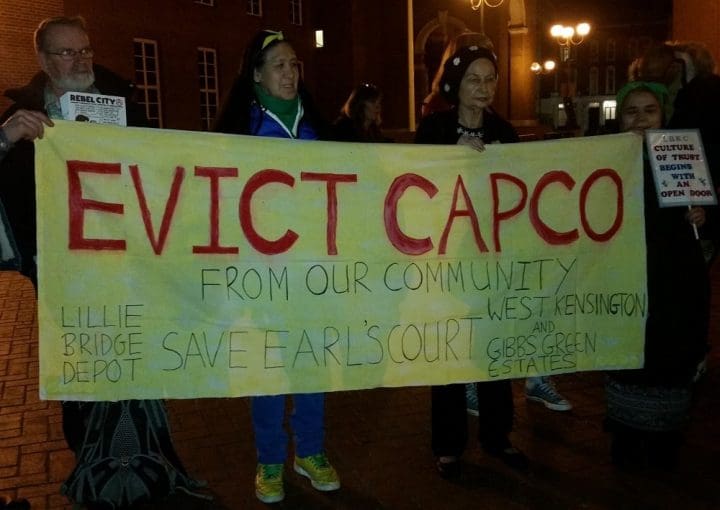 Protesters hold Evict Capco sign - Kensington and Chelsea on Earl's Court