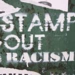 Graffiti of a the Stamp Out Racism slogan and book