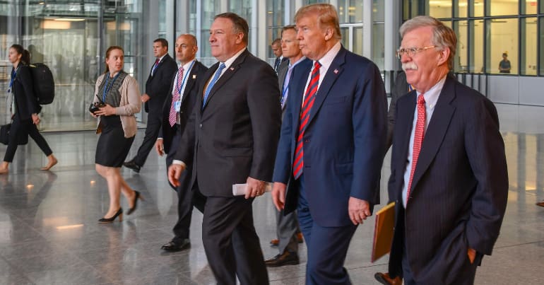 Bolton, Trump and Pompeo walking