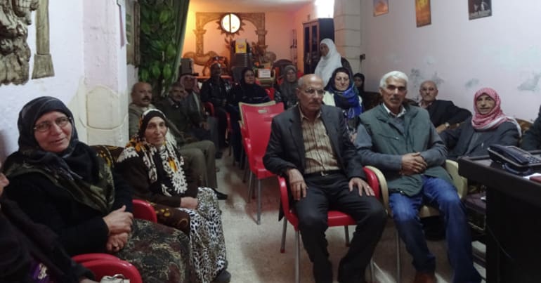 A commune meeting in Cizîrê‎.