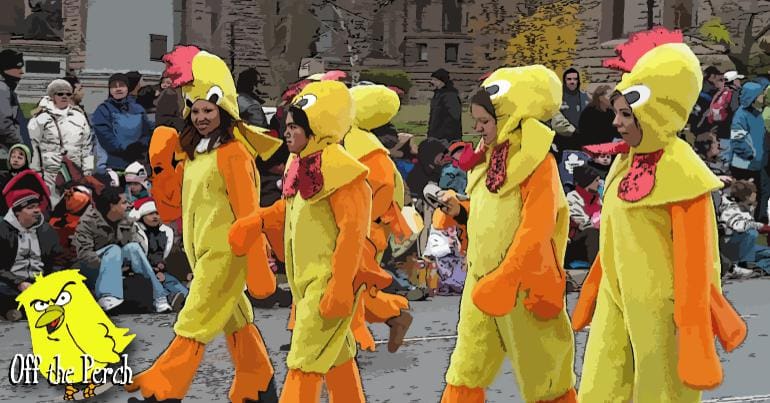 Young people in chicken costumes