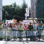 Demonstrators holding a banner that reads "National Homeless Demonstration"