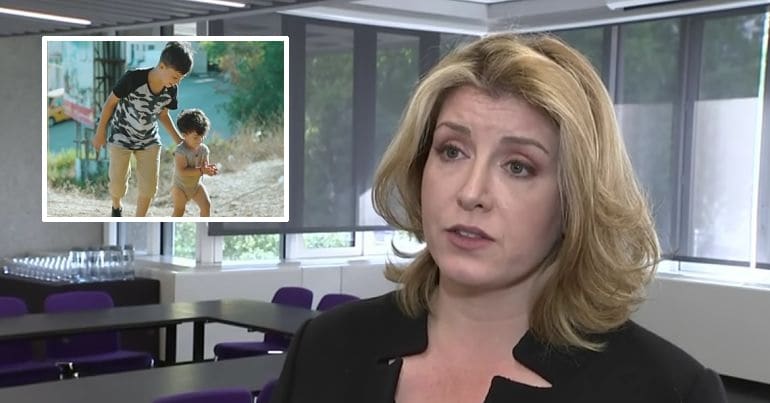 Palestinian children play together; Penny Mordaunt
