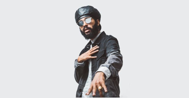 Protoje looking to camera