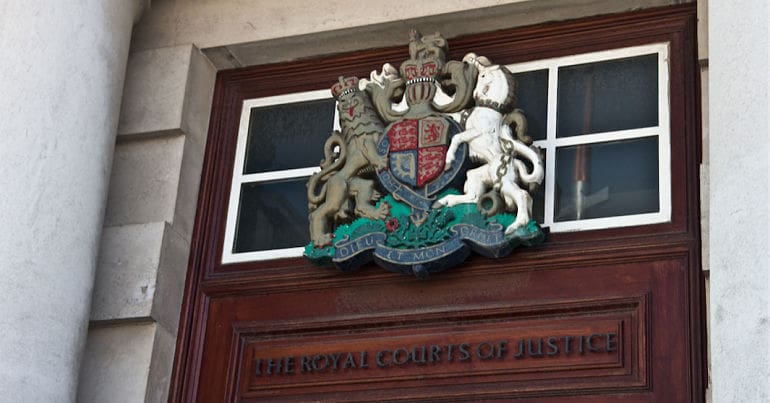 Royal Courts of justice emblem over door