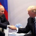 A picture of Vladimir Putin and Donald Trump shaking hands