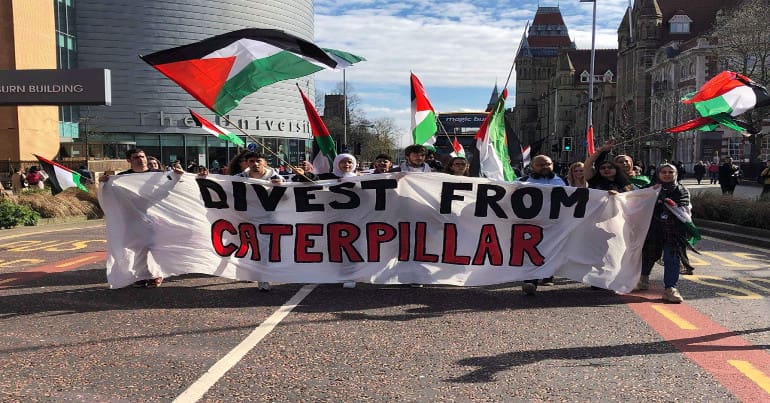University of Manchester students call for divestment from Caterpillar.