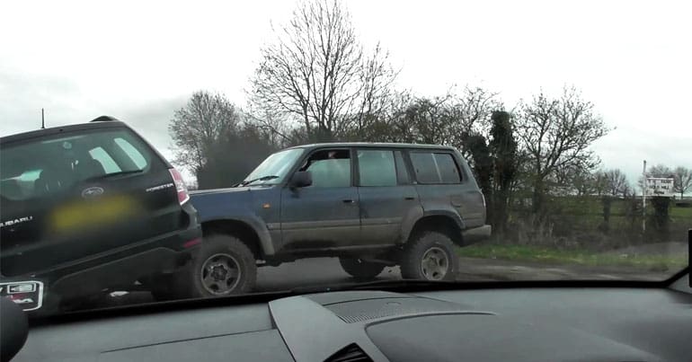 A 4x4 ramming into the side of a car