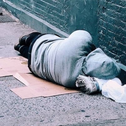 Homeless person sleeping on the streets