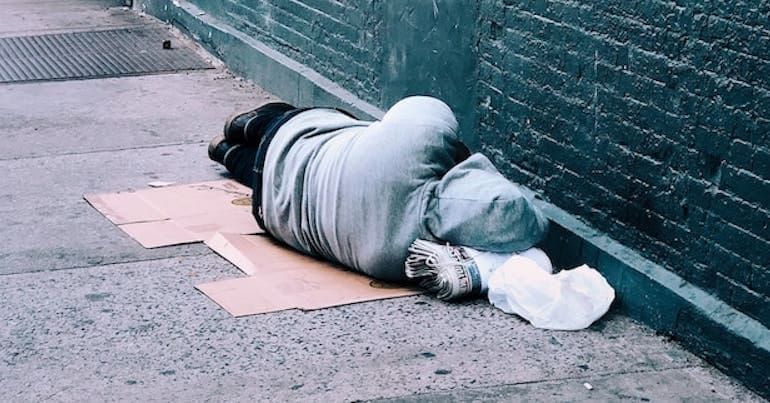 Homeless person sleeping on the streets