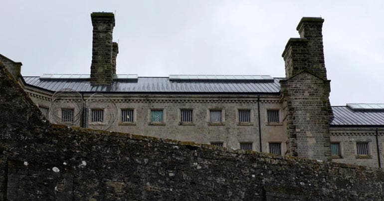 Prison behind high stone wall
