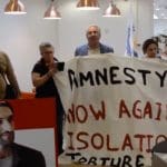 Protesters inside Amnesty International