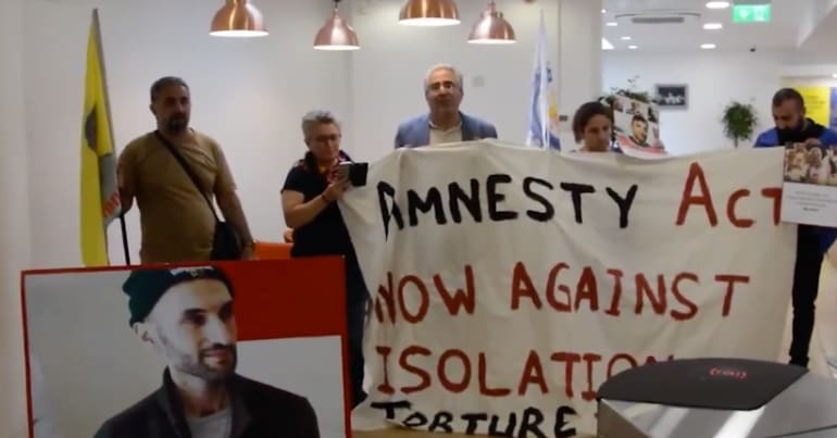 Protesters inside Amnesty International