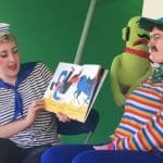 A photo of drag collective, Glitter Hole, at one of their children's performances.