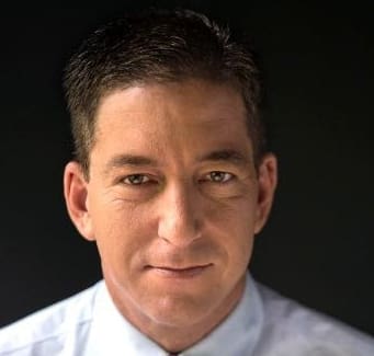 A picture of Glenn Greenwald and Julian Assange