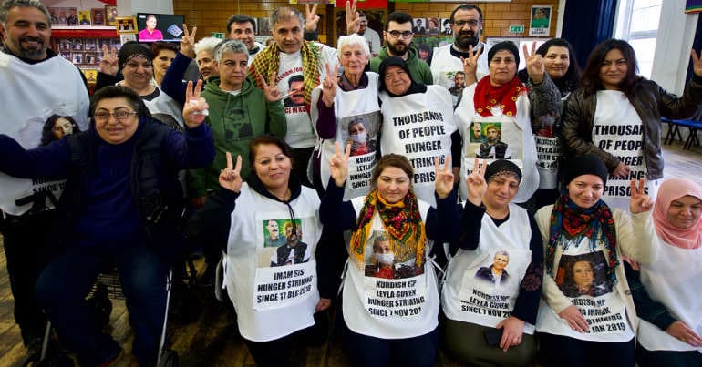Margaret Owen with fellow hunger strikers Ali Poyraz, Nahide Zengin and Mehmet Yilmaz and suppporters at Haringey's Kurdish Community Centre