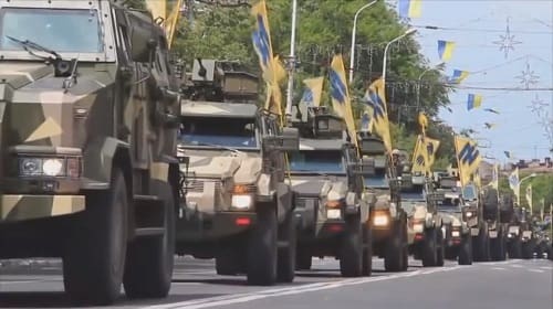 Military vehicles driving with neo-fascist Azov Battalion flags