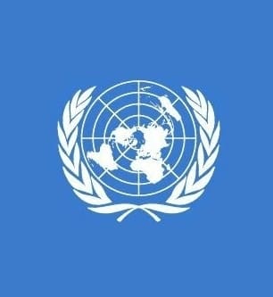 UN logo and Julian Assange