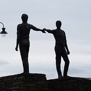 Peace statue in Derry and a satellite image of all Ireland
