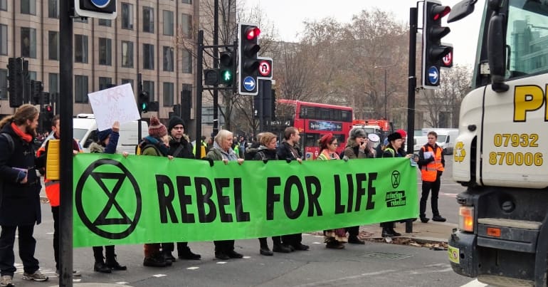 Rebel for Life banner blocking traffic