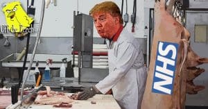 Trump dressed as a butcher in front of a carving table. There's a pig carcas hanging next to him with the word 'NHS' written on it