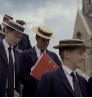 A rollercoaster pictured next to boys from the private school Harrow