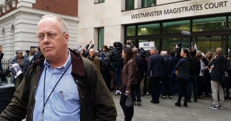 Chris Hedges standing outside of Westminster Magistrates Court
