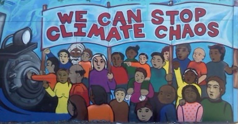 "We can stop climate chaos" mural