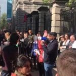 A photo of demonstrators outside Irish parliament on World Refugee Day.