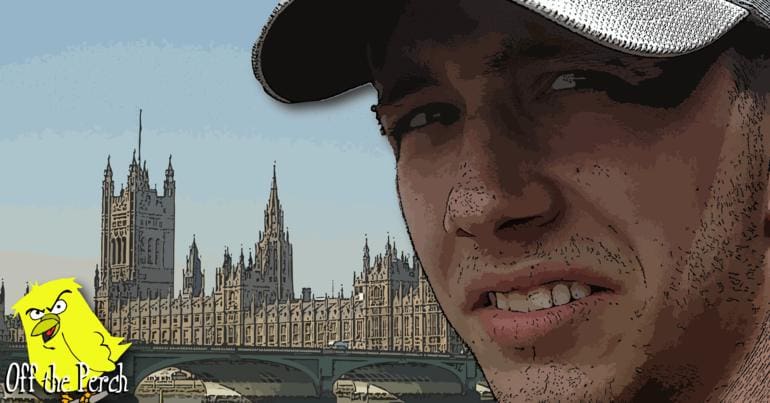 A confused looking man in front of the houses of Parliament