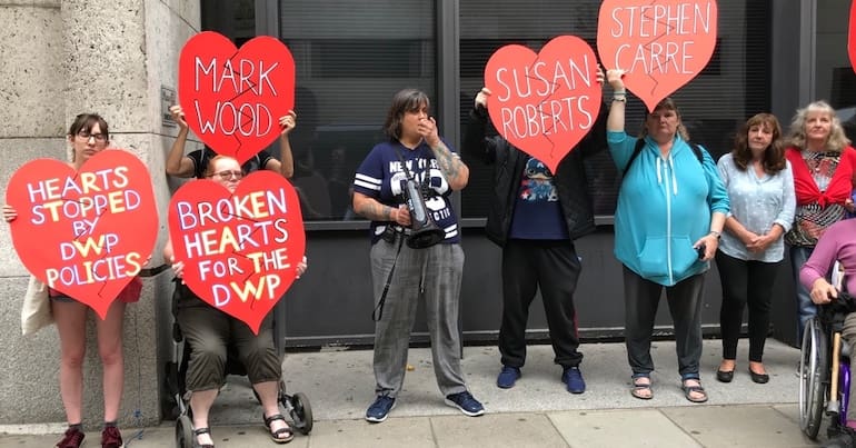 Protestors outside DWP headquarters in London