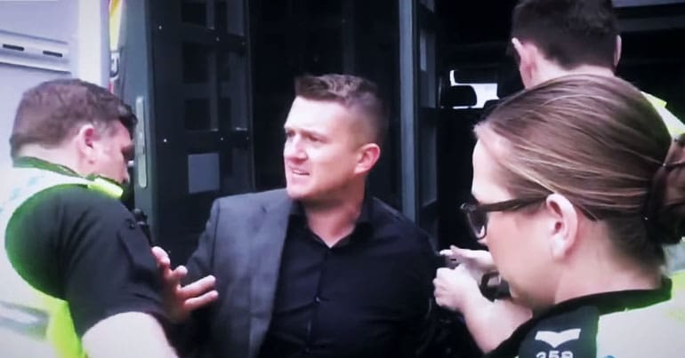 Police arresting Tommy Robinson