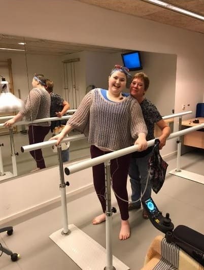 Antonia learning to walk again in July 2018 after five years being bed bound