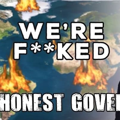 Presenter standing in front of image of world on fire. Text saying "WE'RE F**KED" and "HONEST GOVERNMENT AD"