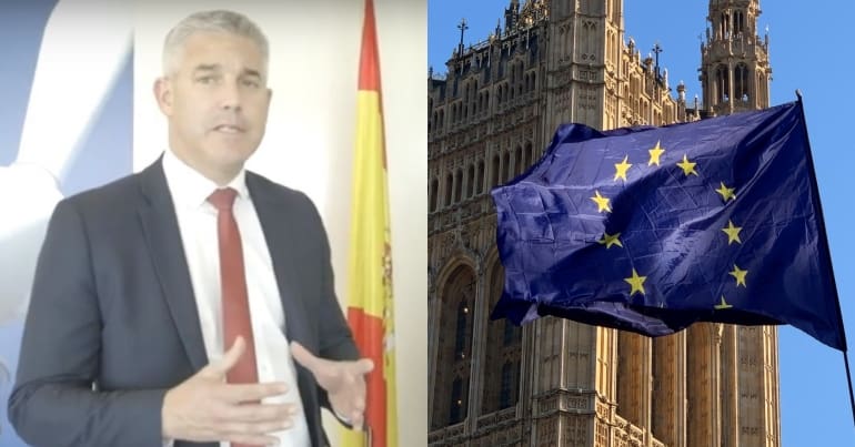 Stephen Barclay in Madrird and the EU flag
