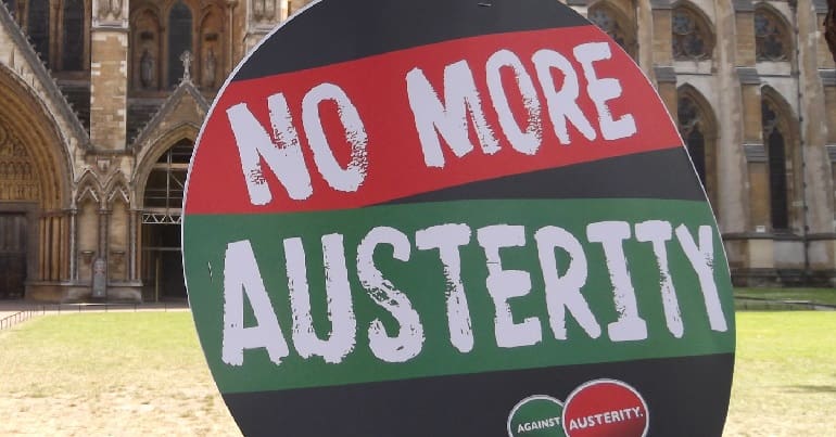 'No More Austerity' placard