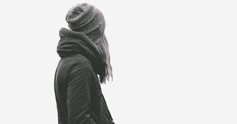 Woman in jacket and knit cap