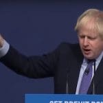 Boris Johnson speaking with manifesto in his hand at manifesto launch 2019