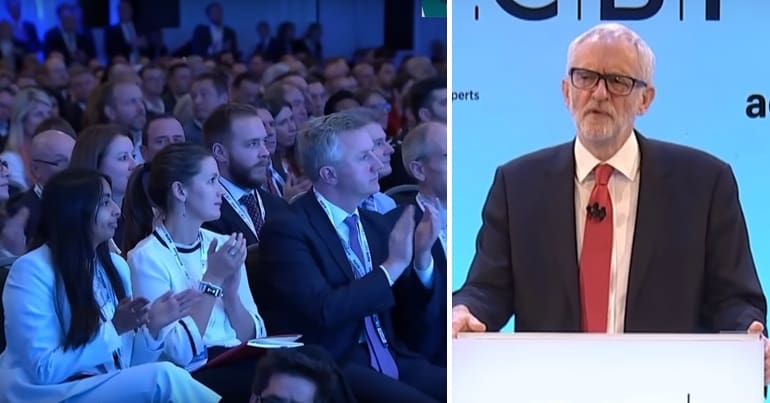 Business people clapping and Jeremy Corbyn